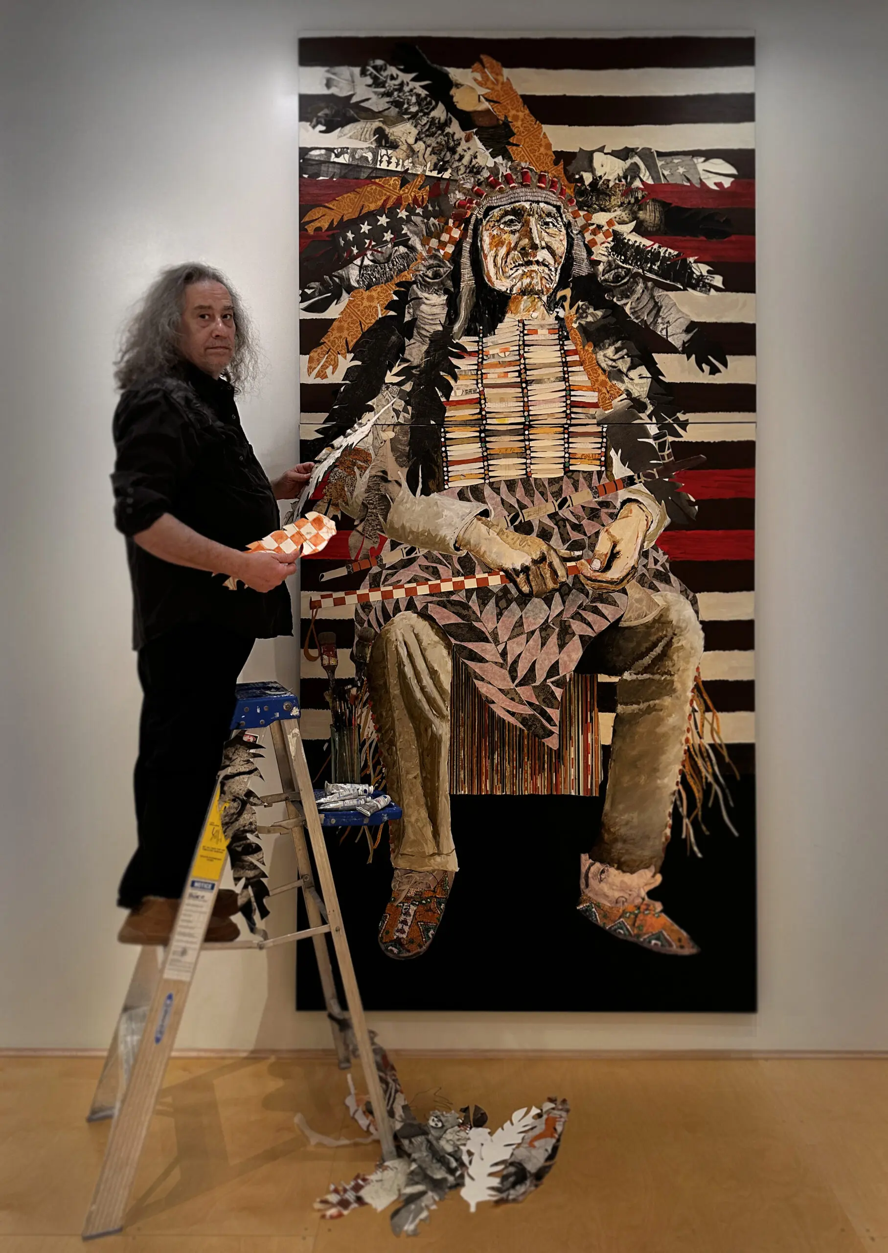 Tomas Lasansky working on his American Dignity painting in the studio