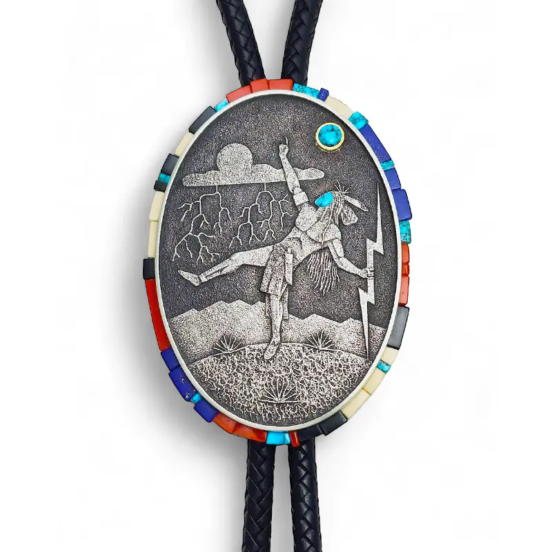 Sterling silver inlaid tufa cast bolotie by Robert Begay.