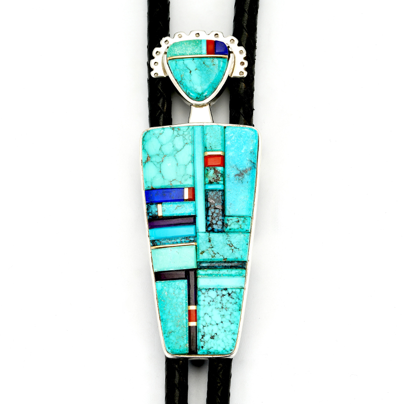 Sonwai (Verma Nequatewa) Sterling Silver Inlaid Stylized Figure bolo and Pendant