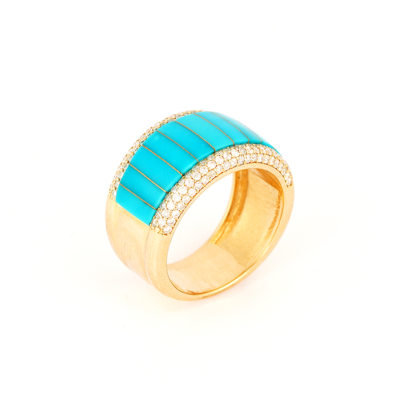 Three-quarter view of a 14k gold ring by Navajo jewelry designer Mia Zaara Hamdouni, featuring graduated Sleeping Beauty turquoise inlay across the top and rows of diamond accents on a polished gold band.