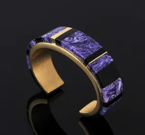 Gold bracelet by Charles Supplee set with charoite and obsidian