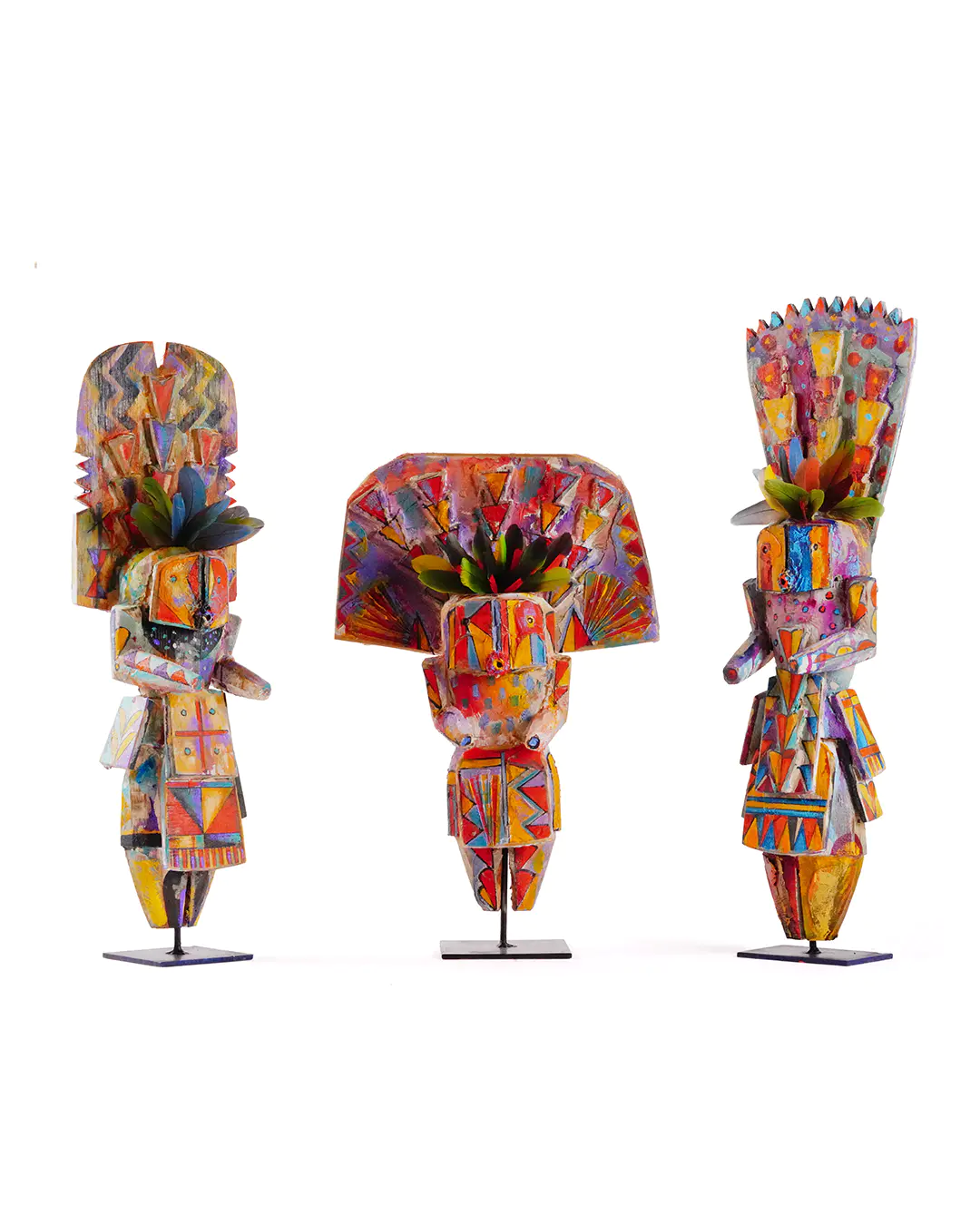 Three wood stylized Navajo Yei sculptures by Sheldon Harvey