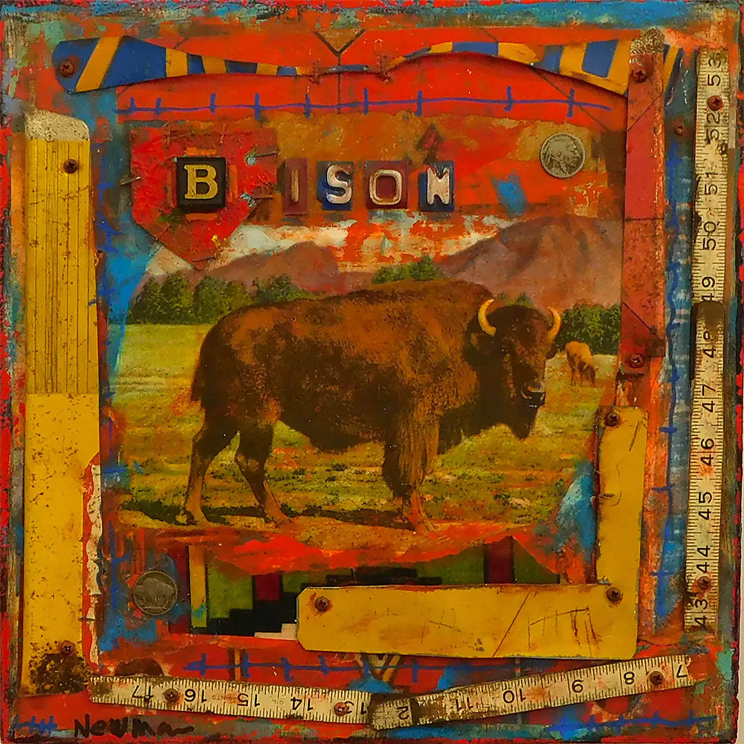 Mixed-media painting of a bison standing in a grassy field with mountains and trees in the background. The central image is framed by bright, weathered collage elements in orange, red, blue, and yellow, including rulers, screws, coins, and painted markings. Letter blocks across the top spell “BISON,” giving the piece a rustic, assembled, folk-art feel.