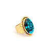 Darryl Dean Begay 18k gold turquoise ring with spiderweb turquoise in a ribbed sunburst bezel on a tufa cast gold band