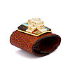 Don Supplee 18k gold Hopi village bracelet with hand-carved ivory houses, gold wire vigas, and turquoise, coral, and ironwood inlay on a cognac leather snap cuff