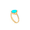Mia Zaara Hamdouni turquoise cabochon ring with Sleeping Beauty turquoise framed by a curve of diamonds in 14k gold