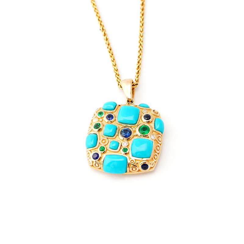 Mia Zaara Hamdouni turquoise mosaic necklace with Sleeping Beauty turquoise, blue sapphires, emeralds, and diamonds set in a textured 14k gold pendant